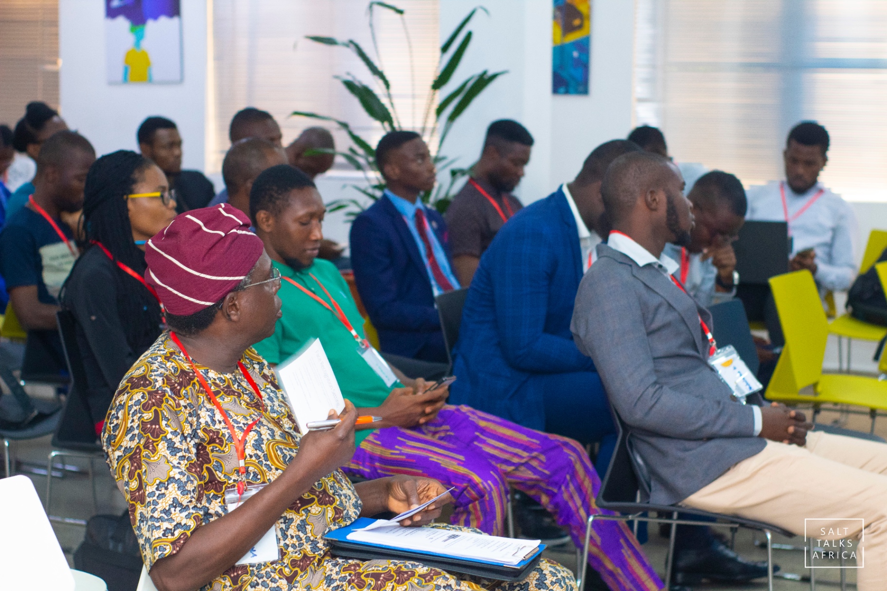 Participants seated and taking notes during a Salt House Africa session