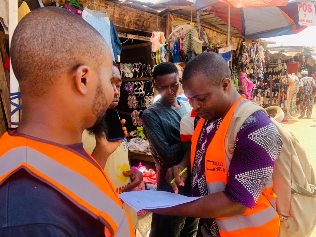 Salt House field officers engaging traders during Beyond Borders fieldwork