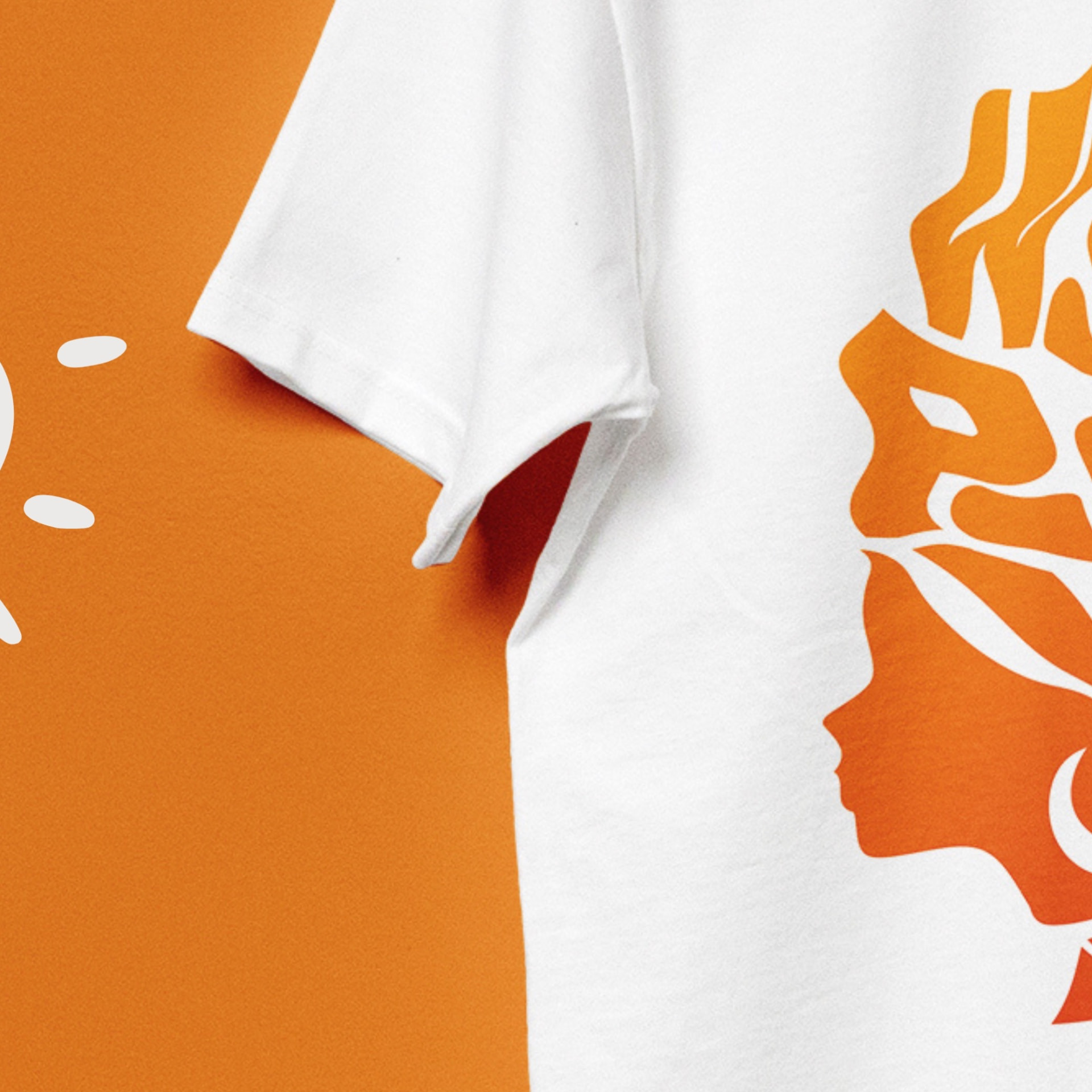 White Salt House t-shirt with an orange typographic illustration of a face and Africa