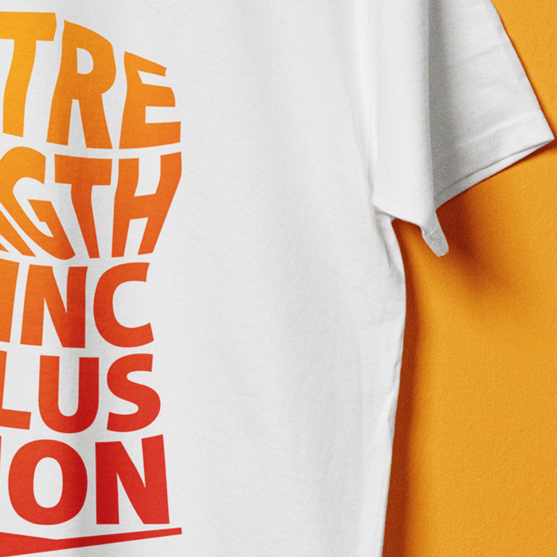 White Salt House t-shirt with orange 'Strength in Inclusion' typography